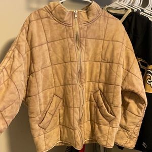 Free people quilted jacket. New without tags. Bought a medium and too big for me